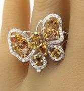 18kt White gold 1.72ctw faceted fancy yellow with 0.61ctw white diamond butterfly ring