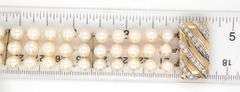 Triple row pearl diamond clasp bracelet in 14kt Yellow gold