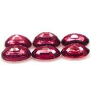 Remarkable 6.06ct violet pink Rhodolite Garnet set