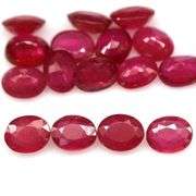 Rich 7.54ct oval cut imperial red Ruby set