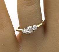 14kt Yellow gold round brilliant cut 3 stone diamond engagement ring