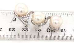 18kt White gold 0.25ctw Swirl diamond with FWP button earrings