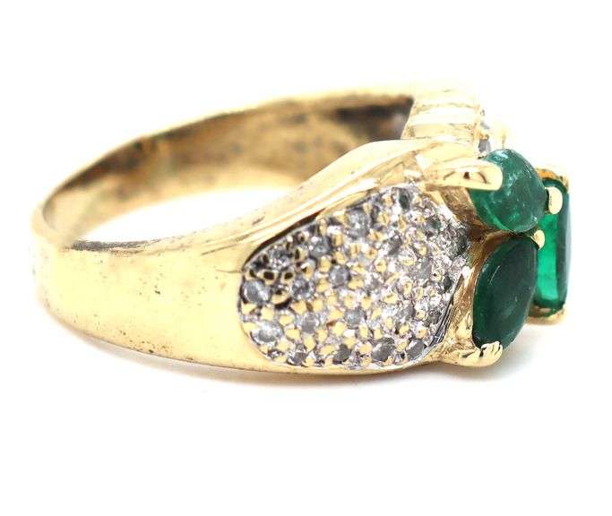 14kt Yellow gold marquise emerald and pave diamond ring