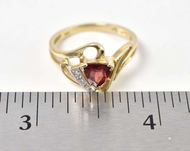 Fetching 10K Yellow Gold Red Garnet Gemstone and Diamond Ring