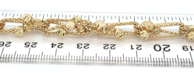 14kt Yellow gold diamond cut double link ball bracelet