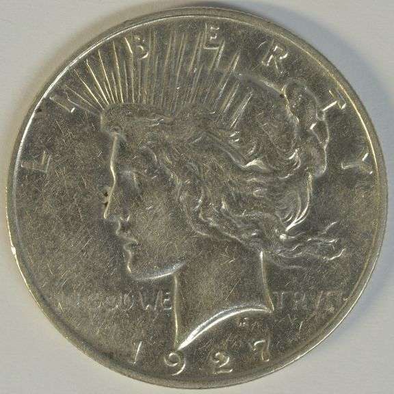 Scarce 1927-D Peace Silver Dollar. Unc Details