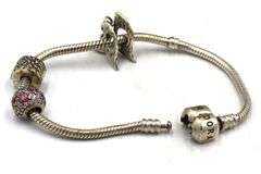 Pandora bracelet with 3 charms