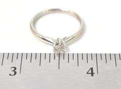 Appealing 14K White Gold Solitaire Diamond Ring
