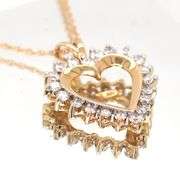 14kt Yellow gold 0.75ctw diamond heart shaped pendant on chain