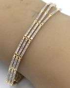 14kt Yellow gold 1ctw 3 row fancy flexible link bracelet