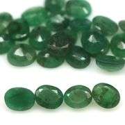 Simply gorgeous 8.50ct rich green Emerald set