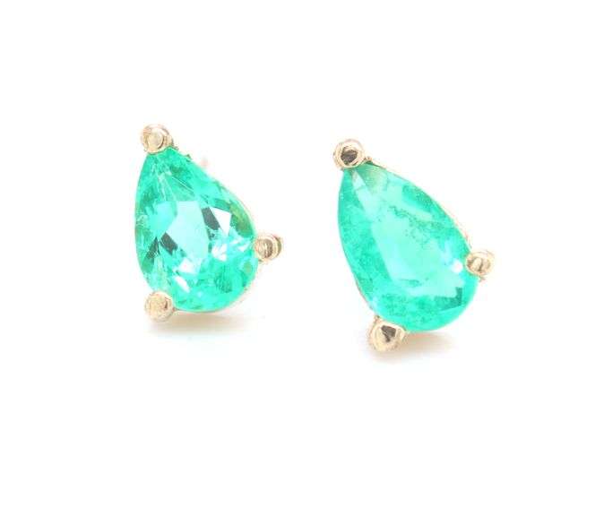 One pair of 14kt yellow gold pear shaped emerald stud earrings