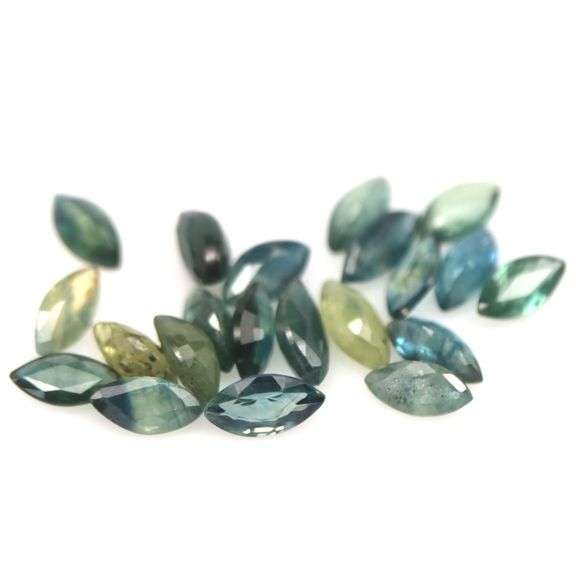 Stunning blue green 7.55ct marquise cut Sapphire set