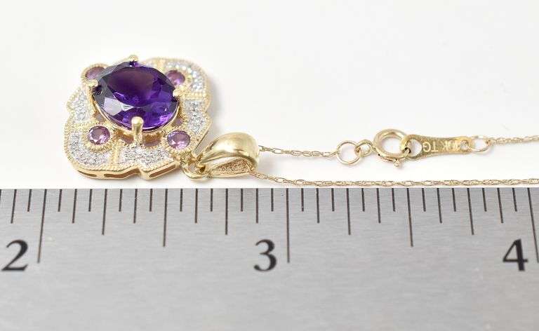 Interesting 10K Yellow Gold Multi-Gemstone Pendant Necklace