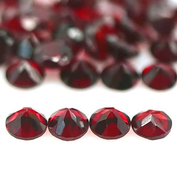 Rich round cut 12.70ct Garnet set