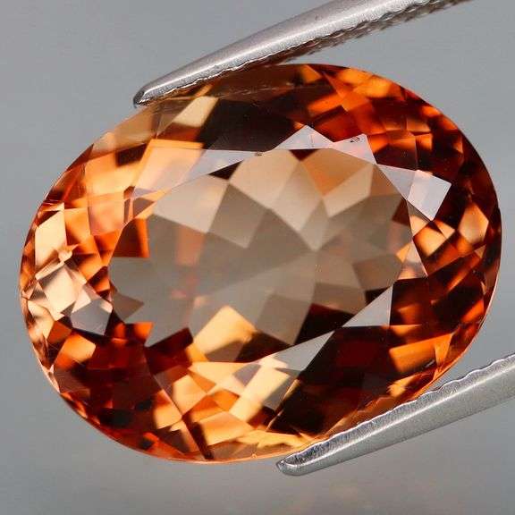 Substantial! 12.87ct high fire Imperial Topaz!