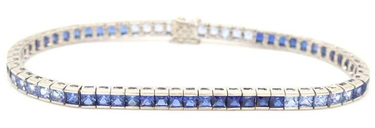 10kt White gold princess cut synthetic sapphire channel set bracelet