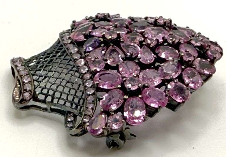 Hand made Italian 18kt  black gold with over 18cttw natural pink and purple sapphire floral arrangem