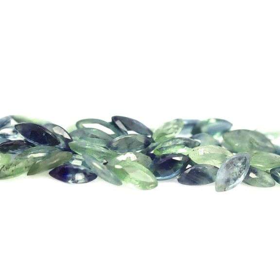 Stunning blue green 8.40ct marquise cut Sapphire set