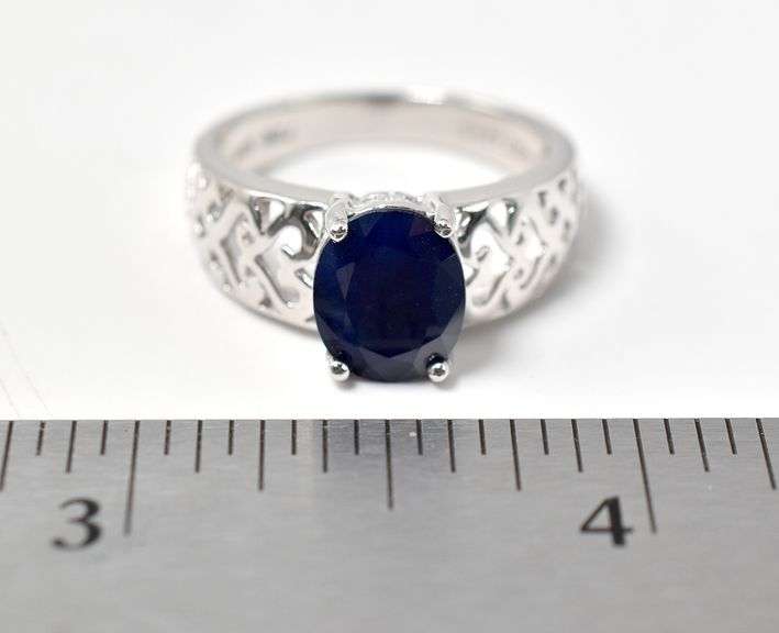 Gorgeous Blue Stone Ring with Heart Detailing on Band in Sterling Silver 4.2grams Size 8.5