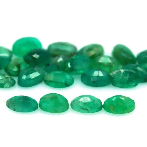 Rich green unheated 7.57ct Emerald set