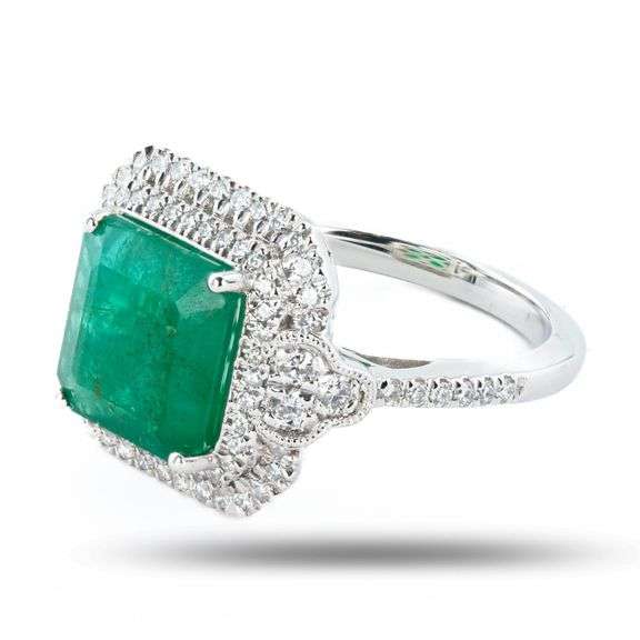 PLATINUM EMERALD AND DIAMOND RING 5.08 C.T.W.