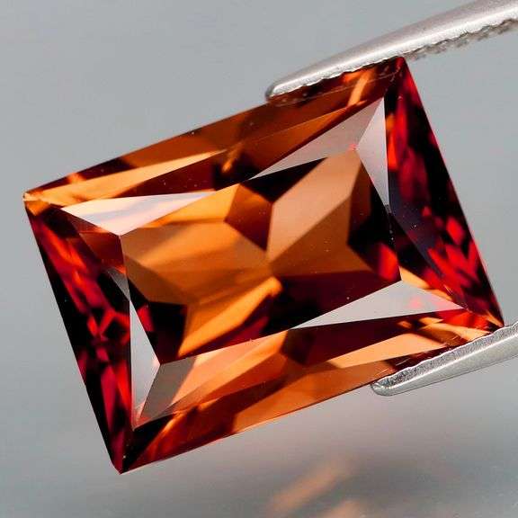 Exquisite 13.74ct whiskey red Imperial Topaz