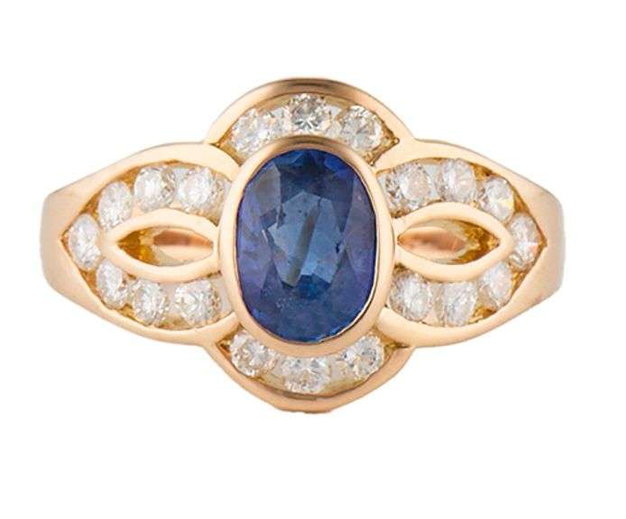 0.65ct Oval Sapphire and 0.25ctw Diamond Frame Ring in 18K