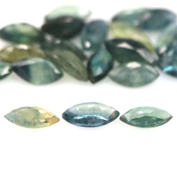 Stunning blue green 7.55ct marquise cut Sapphire set