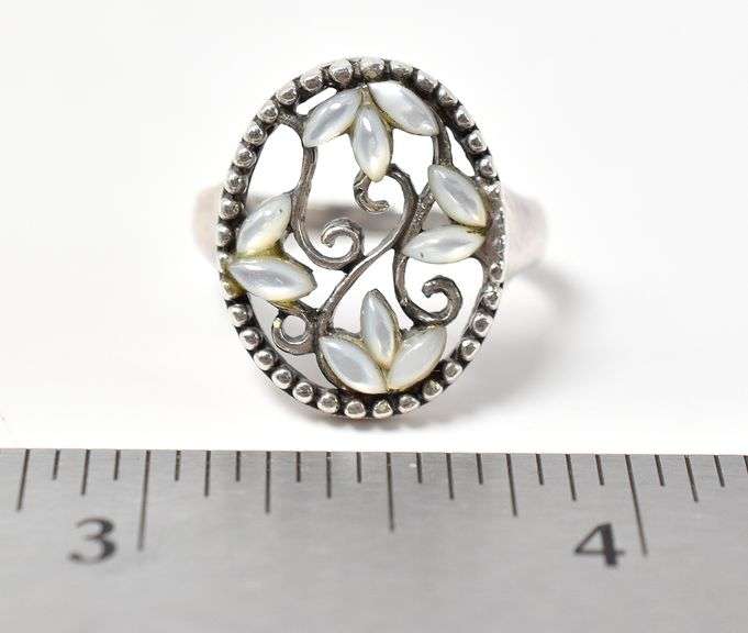 Cut Out Floral Design Ring with White Stones in Sterling Silver 4.1grams Size 7.5