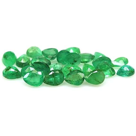 Pear cut 6.56ct Zambian Emerald set