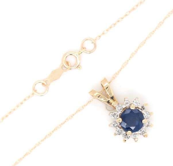 14kt Yellow gold round sapphire and diamond halo pendant on chain
