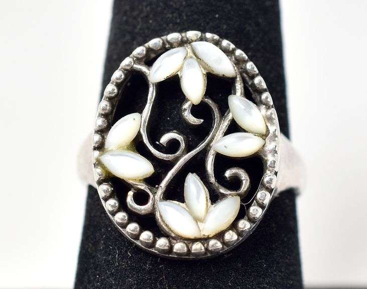 Cut Out Floral Design Ring with White Stones in Sterling Silver 4.1grams Size 7.5