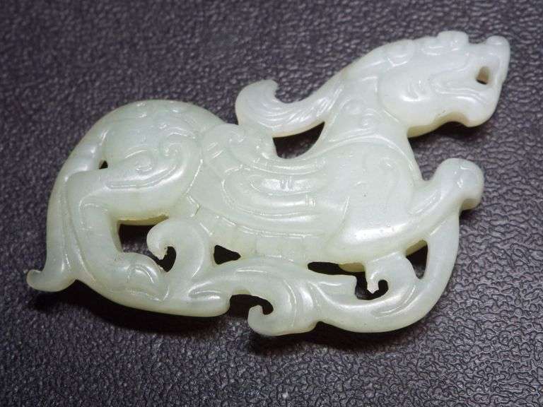 Light Green Jade stylized Dragon Pendant