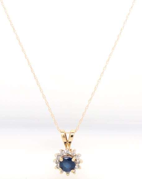 14kt Yellow gold round sapphire and diamond halo pendant on chain