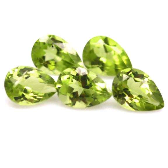 Dazzling 3.83ct untreated apple green Peridot set