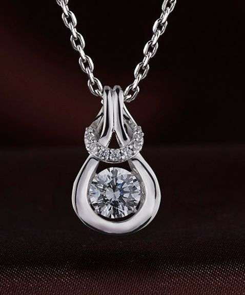 beautiful Love knot sterling silver canter dancing stone pendant