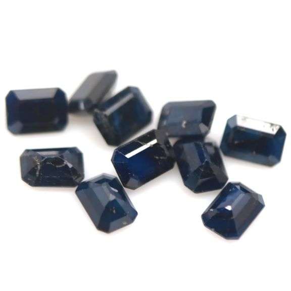 Heavy 12.41ct midnight blue Sapphire set