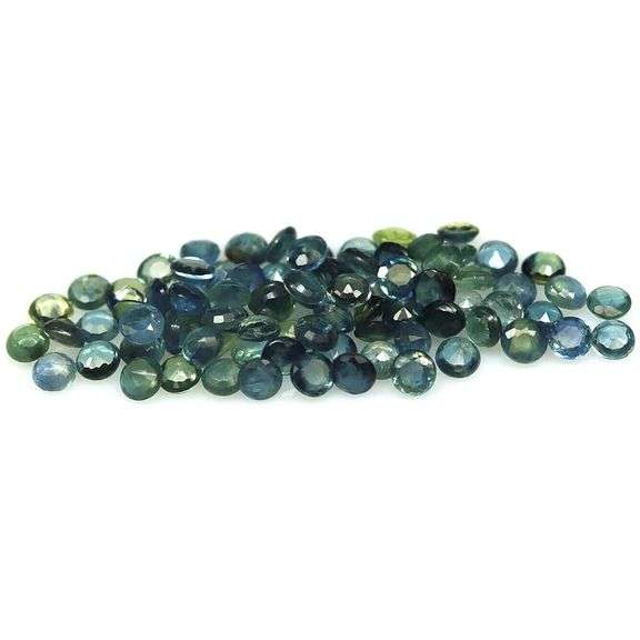 Stunning blue green 5.91ct round cut Sapphire set