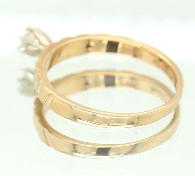 14kt Yellow gold 0.15ct round brilliant cut diamond solitaire ring