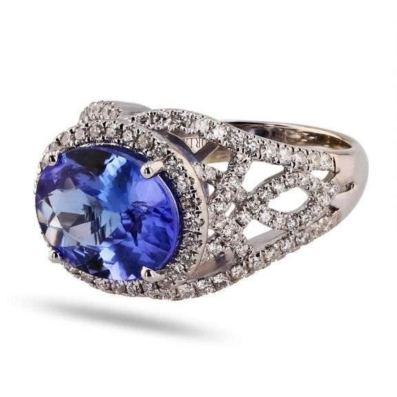14K WHITE GOLD TANZANITE AND DIAMOND RING 5.19 C.T.W.