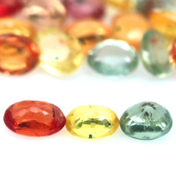 Heated only! 7.20ct fancy color Sapphire set