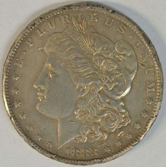 High grade 1883-CC Morgan Silver Dollar. Rim nicks