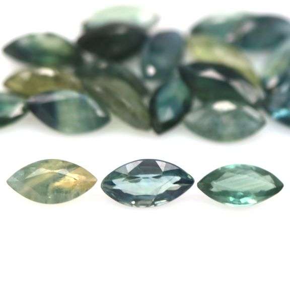 Stunning blue green 7.55ct marquise cut Sapphire set