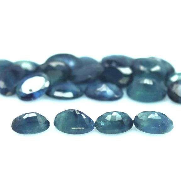 Heated only! 13.55ct greenish blue Sapphire set