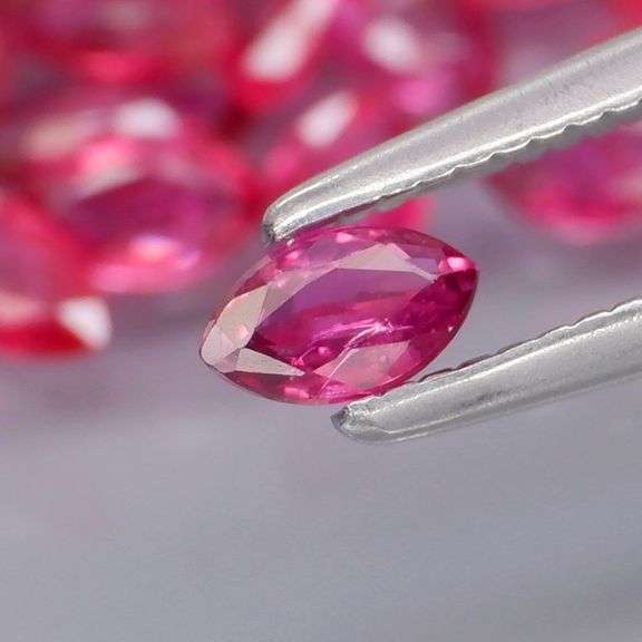 Amazing 5.19ct marquise cut Ruby set