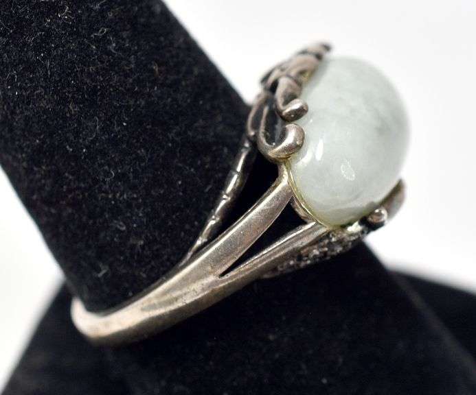 Unique Ring with Light Green Stone and Intricate detailing on Housing in Sterling Silver 8grams Size