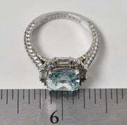 Blue CZ Ring with Accent Gems on Band 5.4grams Size 7 3/4