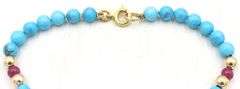 Turquoise, ruby and gold bead bracelet
