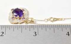 Interesting 10K Yellow Gold Multi-Gemstone Pendant Necklace